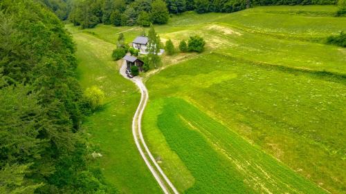 Bostanj House | House in Šentrupert, a house in the countryside, in a quiet valley is Mkčelnova hiša