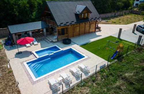 Vukovar House | Danube View Villa with Pool, Jacuzzi & Family Yard by Destination GREEN Croatia