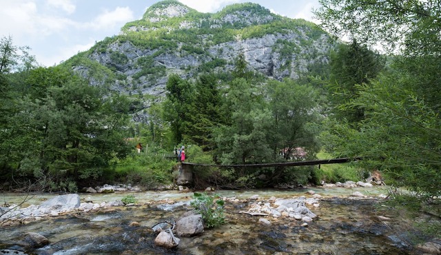 Yellow house in Trenta, next to Soča river in Soca